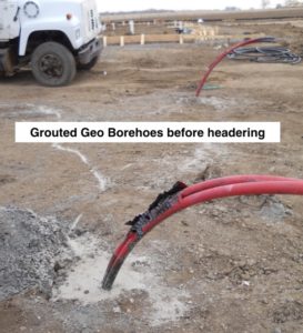 Grouted loop pigtails ready for header trenching and connection