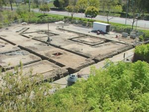 Retrofit bore field and headers under existing parking lot